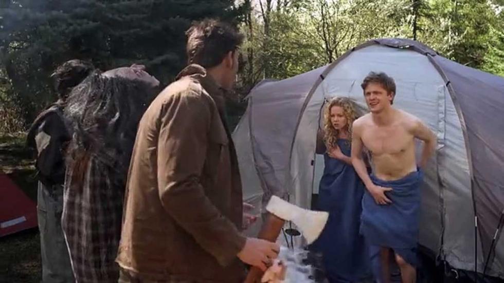 Wrong Turn 5 couple awakened from their tent to man with an axe