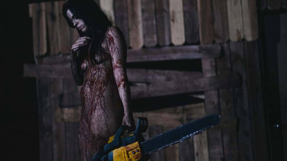 Naked Zombie Girl with a chainsaw