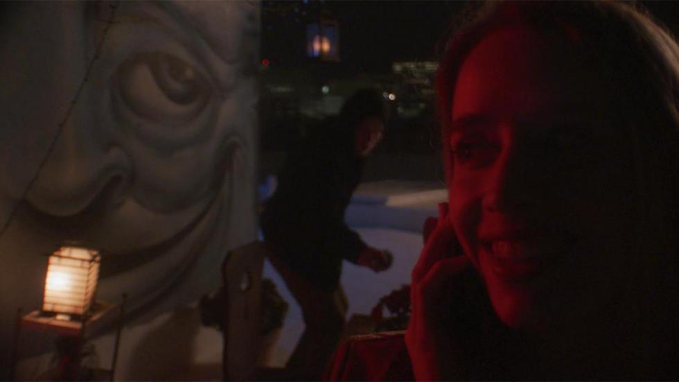 Stalkers film still woman being stalked by dark figure