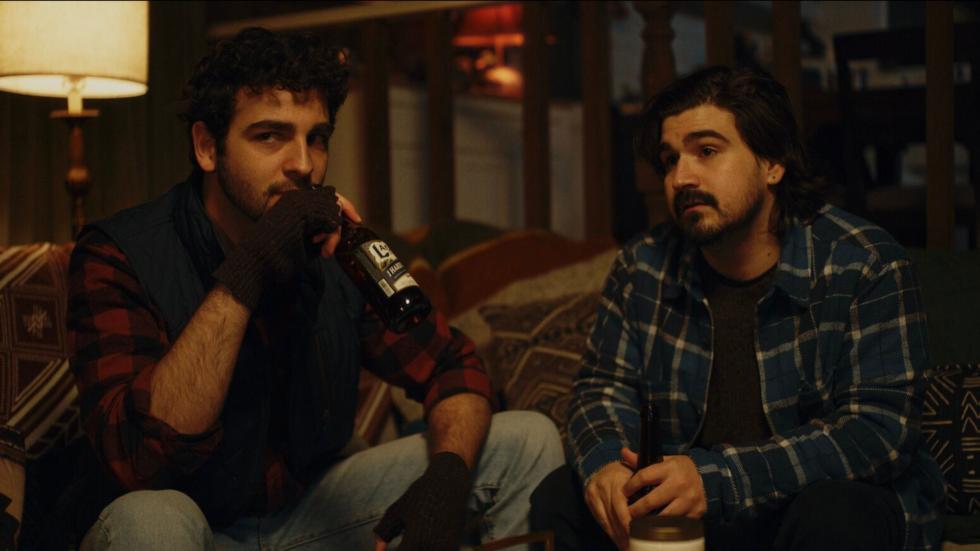 Isaac and his friend drinking beer