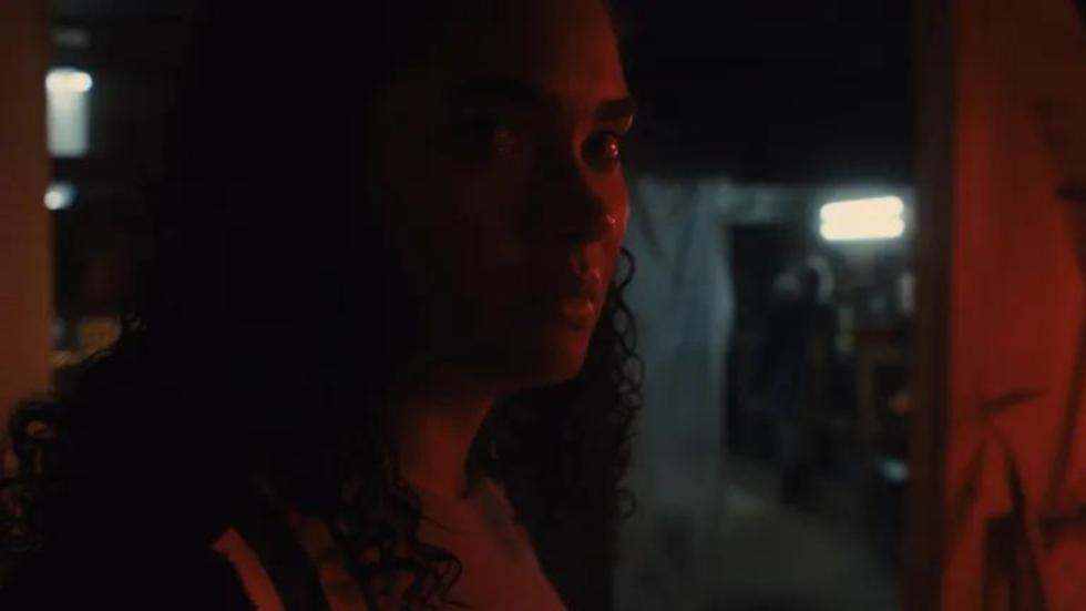 Emily looks on concerned