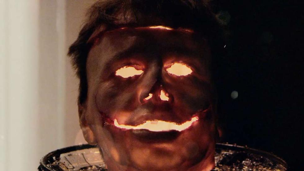 A Tricky Treat glowing pumpkin head
