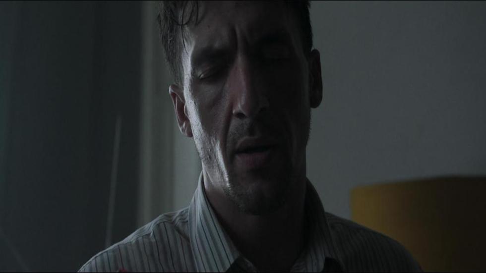 The Passenger film still worried looking man