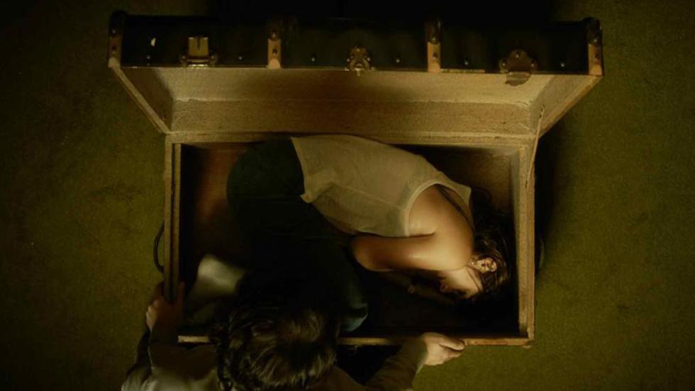 Amandine film still woman in a trunk