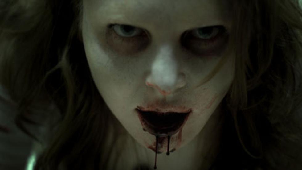 Anniversary Dinner female vampire with bloody mouth