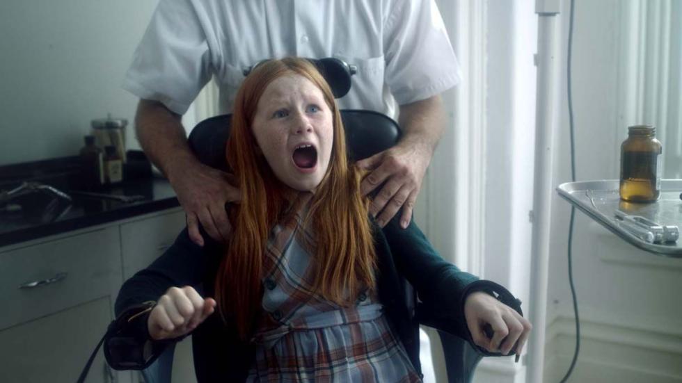 Attack of the Brainsucker young girl screams in the dentist chair