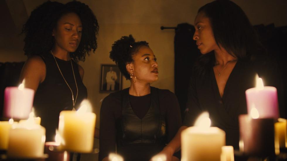 Awake screen shot three sisters amongst candles