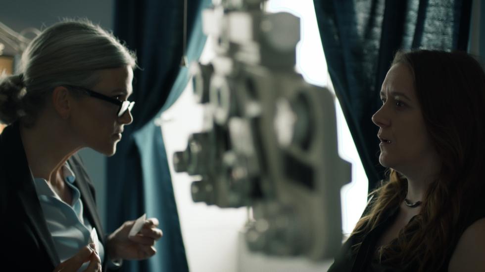 BEHIND YOU film still two women talking to each other