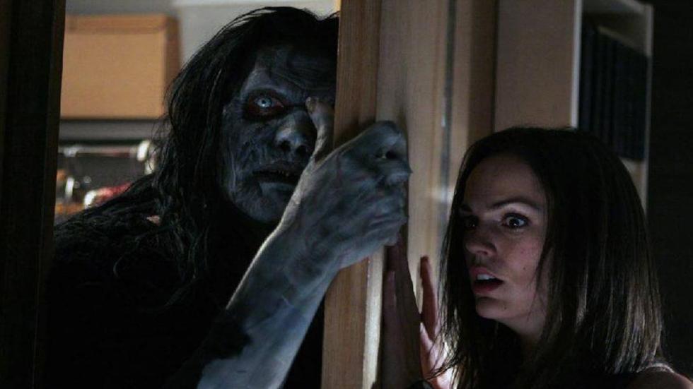 Boogeyman 3 creature on the other side of a door from a woman