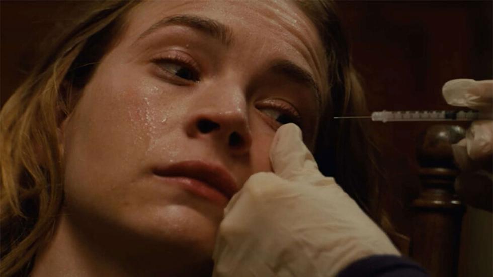 Books of blood film still needle about to go into a guys eye
