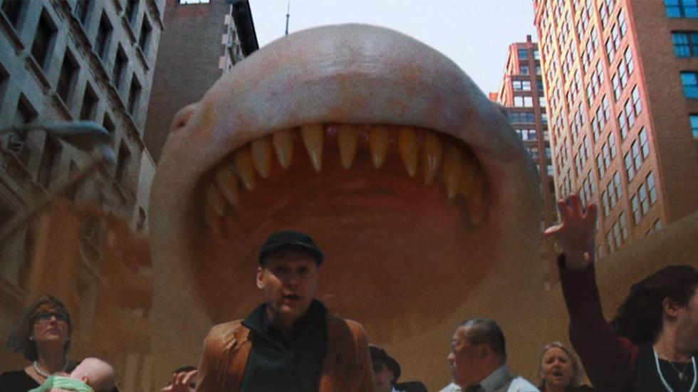 Chillerama huge creature with teeth chases people down the road