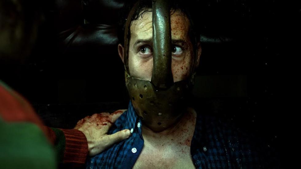 Fear, Inc. film still torture mask on woman