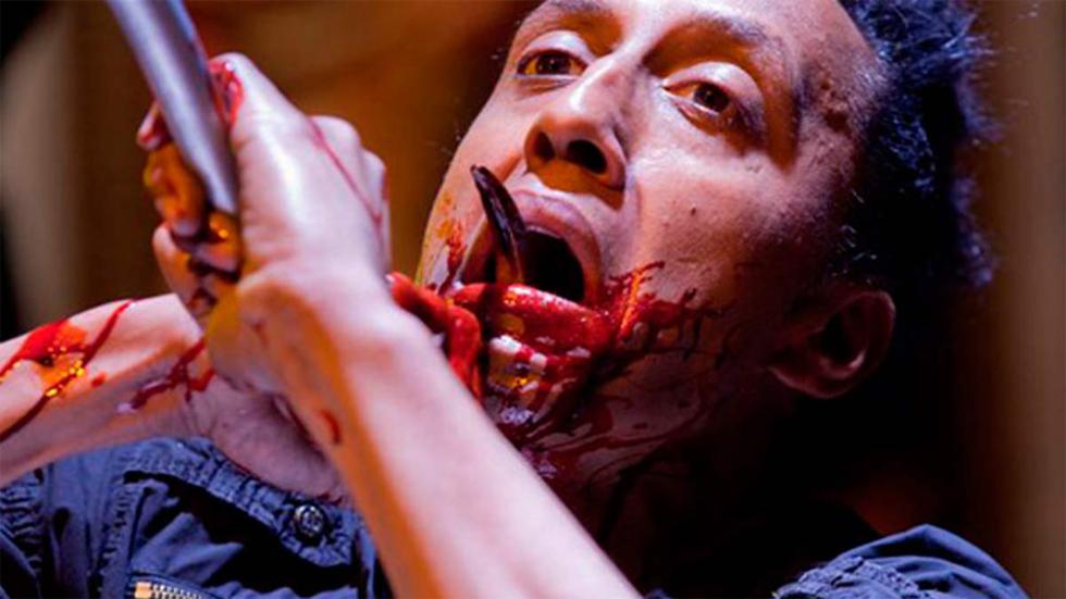 The Collection man with hook in his mouth