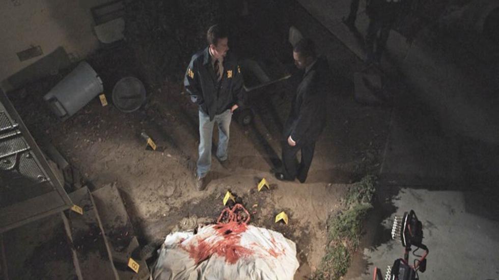 Compulsion detectives look over crime scene