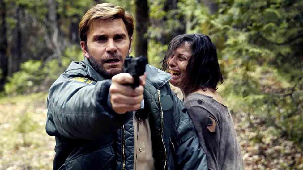 Circle of Stone Film Still man with gun
