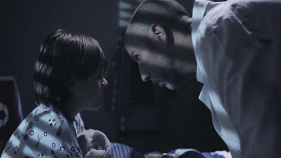 Count to 10 father talking with his son in his bed.