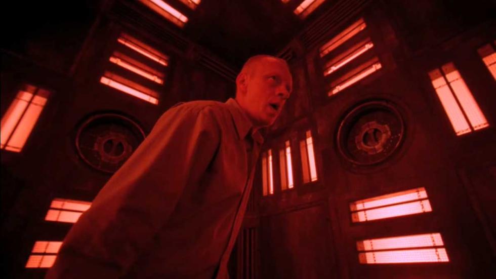 Cube Zero A man walks through an ominous construct of cubeshaped rooms