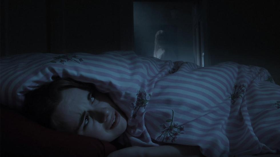 Damned by Dawn scared woman hides under her blanket
