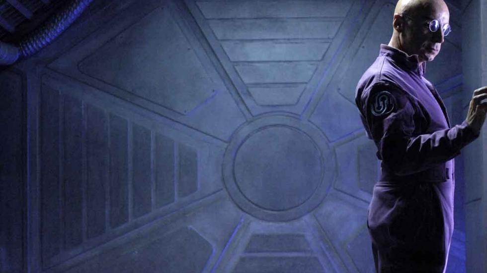Dante 01 man in purple space attire works machinery