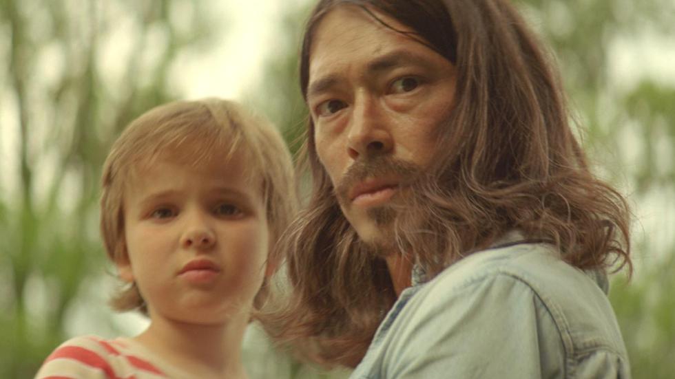 Deliria film still man with his child
