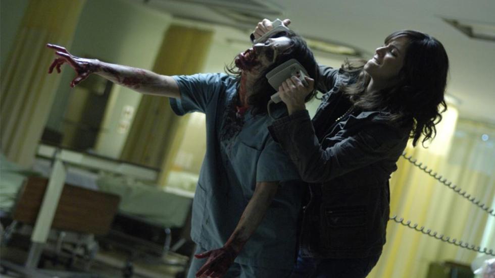 Diary of the Dead woman puts difibrillator on man's head