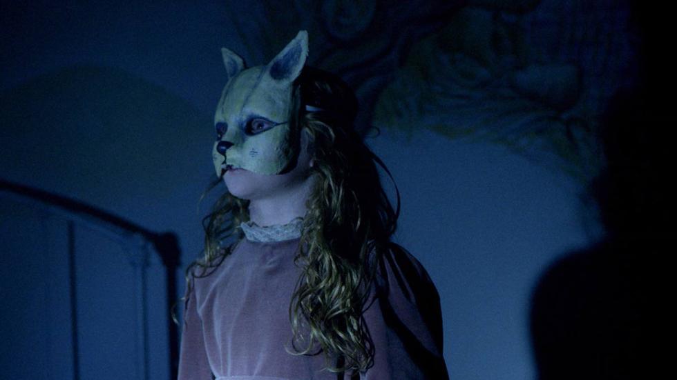Discarnate film still girl in a cat mask