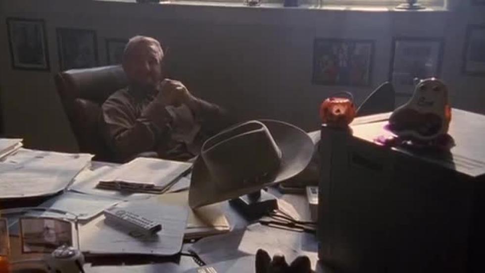 Driftwood sheriff sits at desk