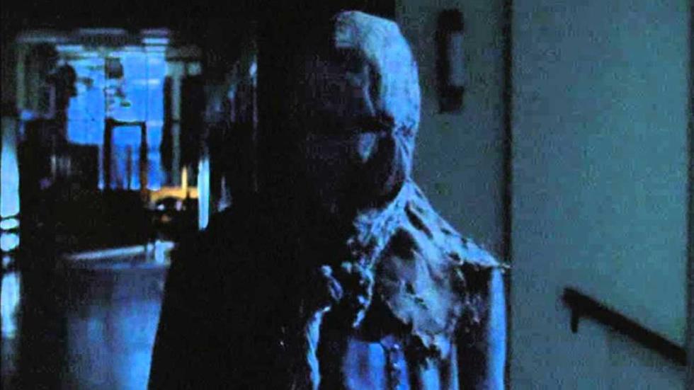 Drowning Ghost A masked creature walks the halls of a school