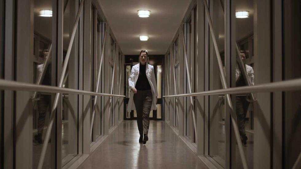 Dublika woman walking down a hall