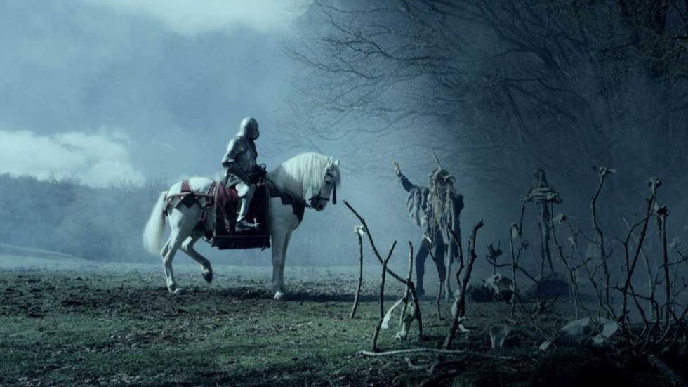El Bosque Negro armored man on horseback approaches skeleton ghouls