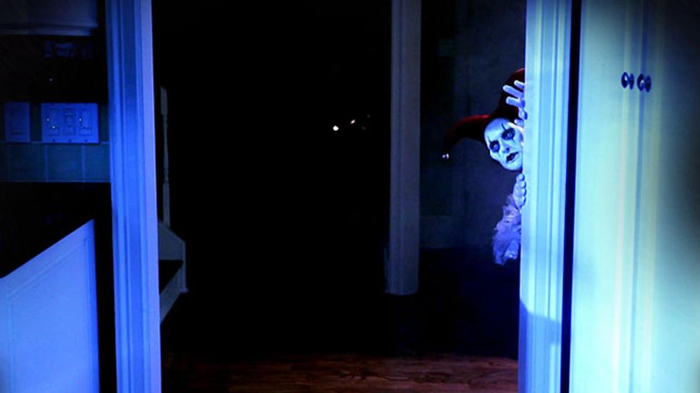 An Evening with my Comatose Mother creepy clown peaks out from door