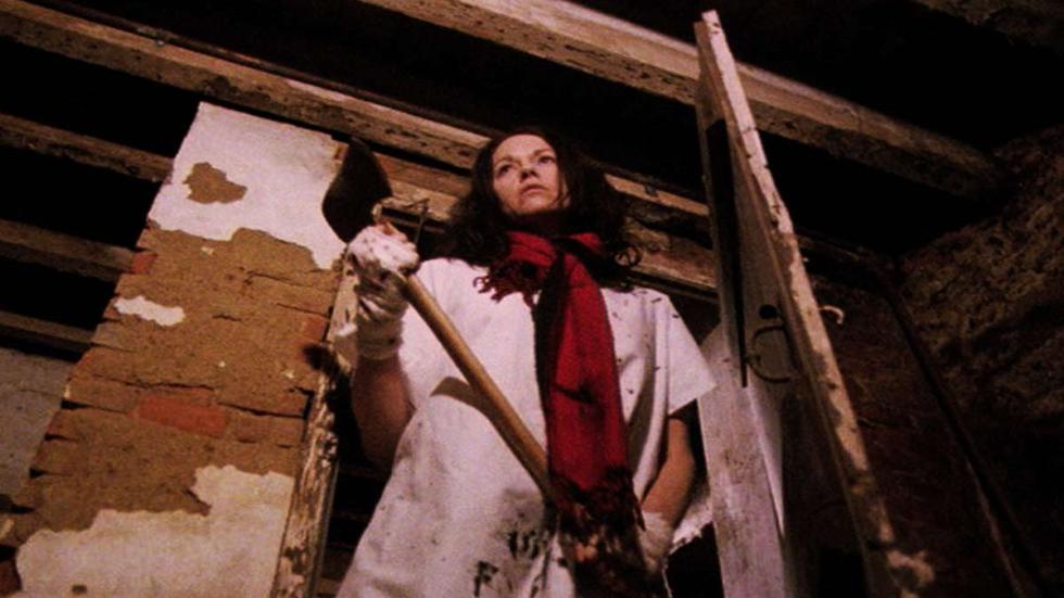 Finale woman stands with an axe
