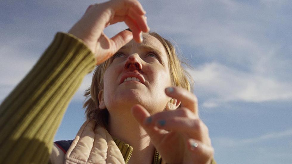 Woman with bloody nose