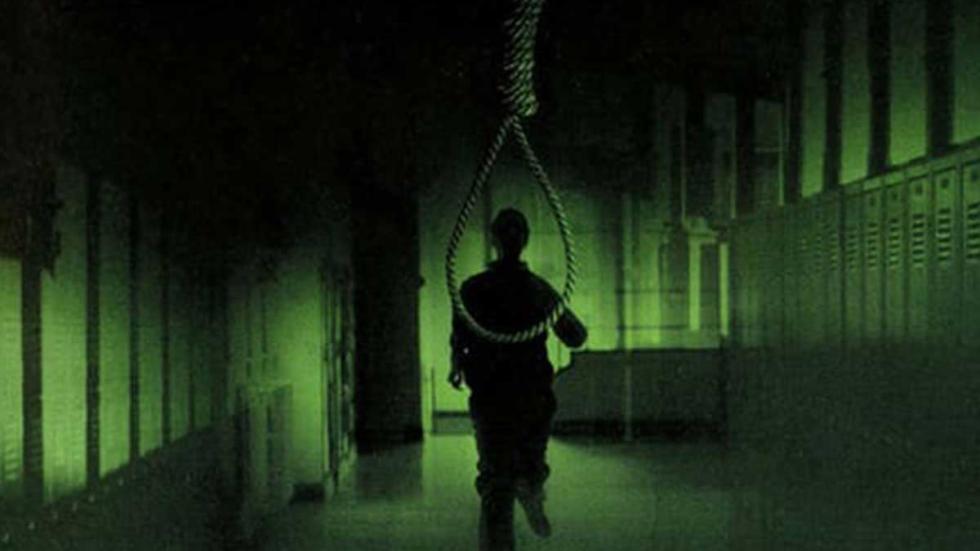 Hangman's Curse a figure walks towards a hanging noose.