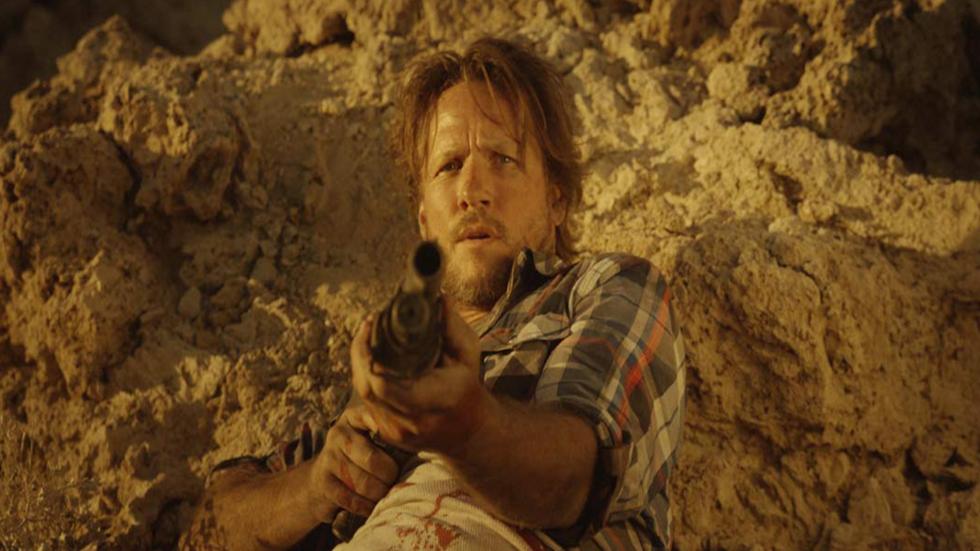 Happy Hunting film still man with a shotgun 