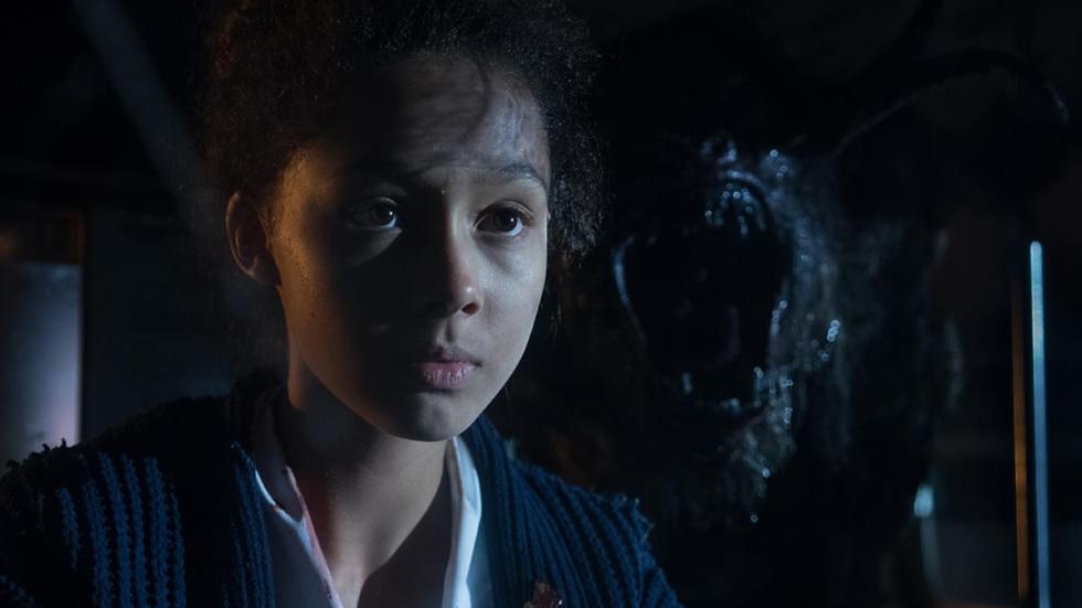 Here there be Monsters film still young girl with monster behind her