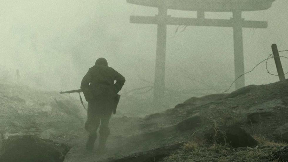 Hold Your Fire armed military man walking in the fog