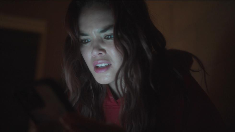 The night shift operator at a mental hospital looks scared