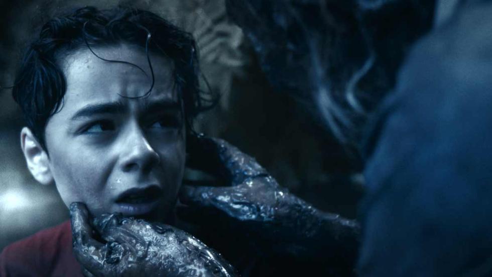 I Love Eva Marsh film still boy being held by creature