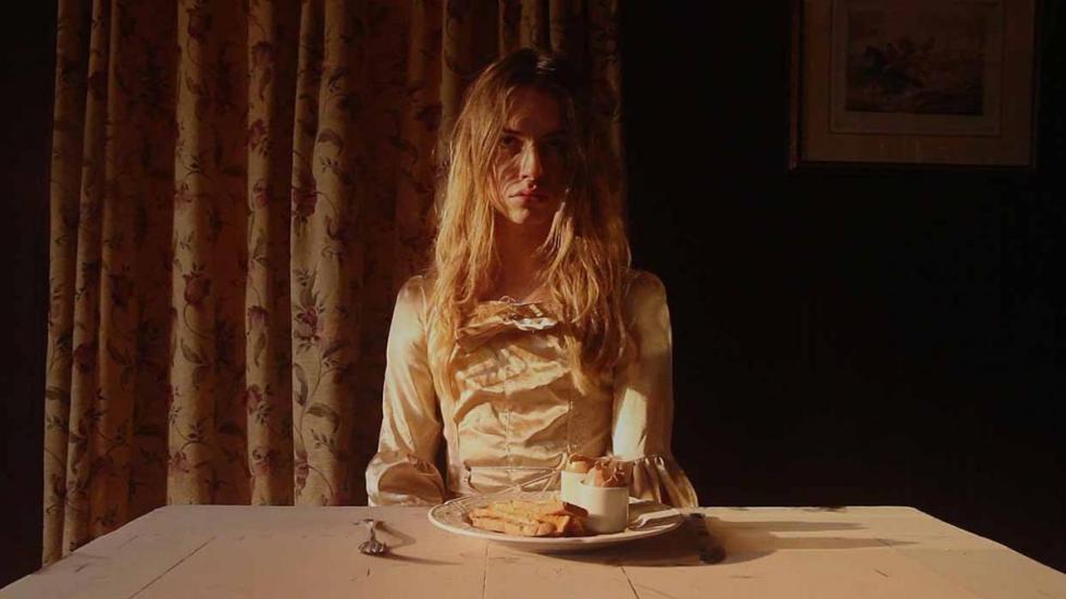 Oedipus film still woman at the table 