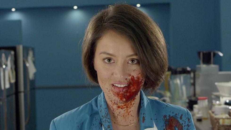 In the Kitchen With . . . film still bloody faced woman