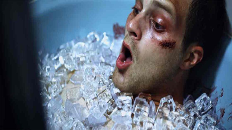 INCUBATOR man immersed in ice