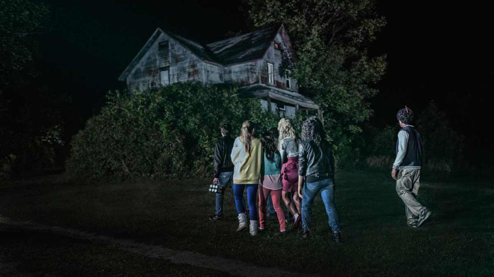 Lost After Dark A group of young people walking towards a scary house