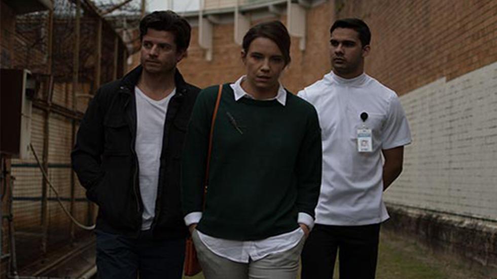 Lavender film still people walking around a prison