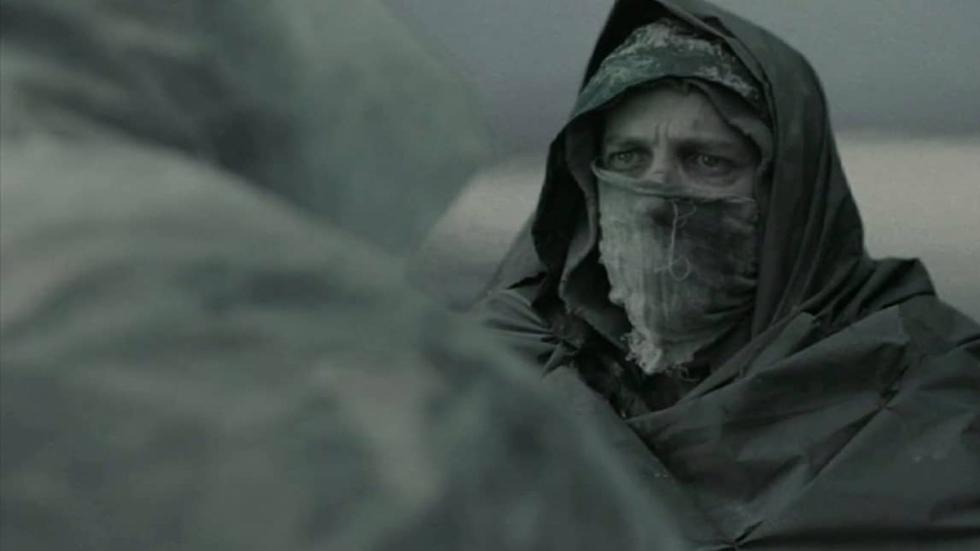 Lazarus Taxon masked man speaks to another