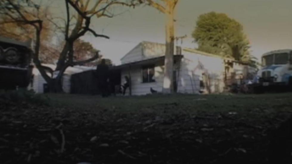 Legion: THe Word Made Flesh A man approaches a house