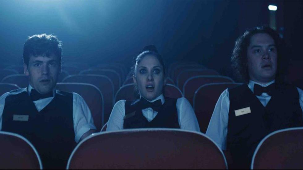 Porno film still theater workers watching movie 