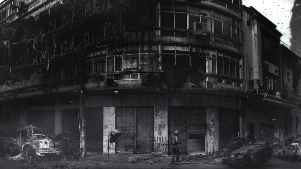 Lunatique film still barren town with a lone person.
