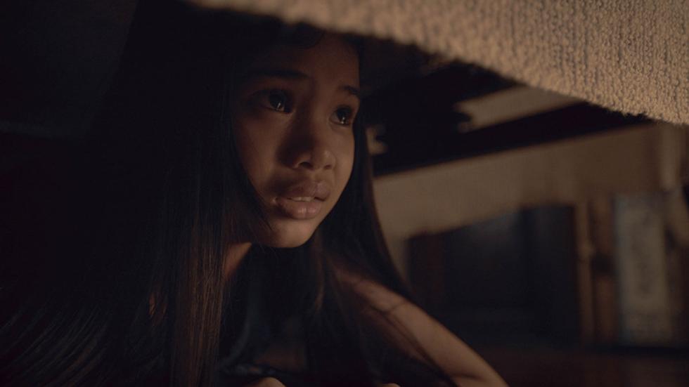 Marian film still young girl hides 