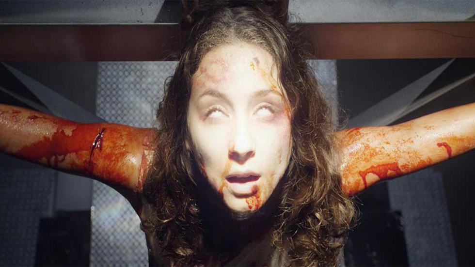 Martyrs crucified woman with white eyes and blood